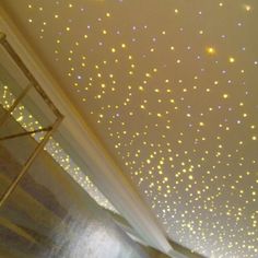 the ceiling is decorated with yellow and white stars