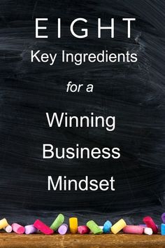 the words eight key ingredients for a winning business mindset written on a blackboard