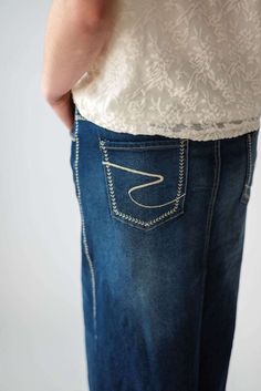 Every modest wardrobe deserves a maxi denim skirt and we're excited to offer the Arabella in sizes XS-5XL so all women have options! Crafted of soft and stretchy denim fabric, this skirt features a non-bulky elastic waist, four functional pockets, only light vintage fading and top-stitching details on back pockets and seams. Style this maxi denim with a range of tops or sweaters and wear for everything from a brisk morning walk to frosting cupcakes for a bake sale. Fit: Check the size charts. So Frosting Cupcakes, Maxi Denim Skirt, Modest Wardrobe, Be Intentional, Morning Walk, Stitching Details, Denim Maxi Skirt, Garment Labels, Bake Sale