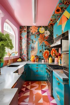 a colorful kitchen with blue cabinets and pink walls