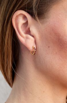 Easy-to-wear hoop earrings will add significant polish to even your most casual ensembles. 1/2" drop; 1/8" width Snap-post closure Sterling silver/18k-gold plate/cubic zirconia Imported Jewelry Ideas, Nordstrom Rack, Garnet, Cubic Zirconia, 18k Gold, Gold Plate, Hoop Earrings, Yellow Gold, Nordstrom