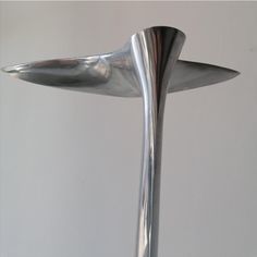 a metal object that is standing up on a table