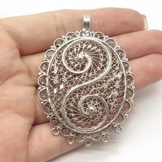 Great antique condition.  925 Sterling Silver Antique Art Deco Filigree Pendant  Weight: 12.8g   WELCOME TO PAWN SHOP We are an actual pawn shop and have been in business for over 25 years. Since 1990, our establishment has been serving a variety of clients by providing them with short term cash solutions and options of liquidity regarding their treasured heirlooms. Acknowledging that today′s customers are very sophisticated and are looking for a variety of investments, our acquisitions are hand Art Deco Filigree, Jewelry Design Drawing, Cad Cam, Filigree Jewelry, Filigree Pendant, Gem Ring, Pawn Shop, Design Drawing, Antique Art Deco