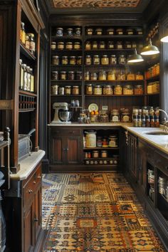 a kitchen filled with lots of different types of jars and pans on the shelves