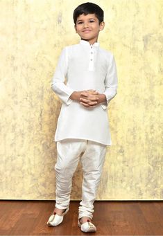 This exquisite Kids Kurta Set is specially crafted for Birthdays , Indian weddings and festivals. The set includes a beautifully self-embroidered Dopion art silk top, paired with your choice of a ready-made Dhoti, Chudidar or Patiyala bottom. Attributes 1. Top - Premium Quality Cotton Silk Fabric 2. Bottom - Ready Made Chudidar/ Doti/Patiyala 3.  Color -Pistachio ,Fawn,White, Light Beige,Green Note For Perfect Fitting * Pls Check the kid's Body Chest Exact Measurement With Out Adding Any Space or Gap From Your Side Boys Wedding Dress, Kurta Pajama For Boys, Wedding Dress Kids, Boys Sherwani, Ring Bearer Suit, Kids Kurta Pajama, Kids Ring, Kids Kurta, Wedding Dresses For Kids