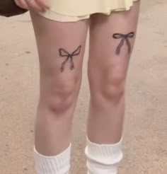 a woman with two bows on her legs