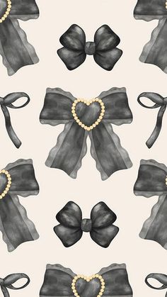 a pattern with bows and pearls in the shape of a heart