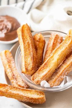 Air Fryer Churros fried to golden perfection make a delicious dessert for your next Mexican-themed party! Freshly baked and coated with cinnamon-sugar this easy Air Fryer dessert is a lot easier to make at home than you think. #CincoDeMayo #Churros