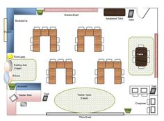 a floor plan for a conference room with tables and chairs, laptops on the desk