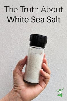 the truth about white sea salt in a glass bottle with text overlay that reads, the truth about white sea salt