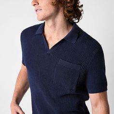 This Arizona men's textured knit polo top is an ideal choice for elevating casual style looks. Made from a cotton waffle knit, this short-sleeve pullover sweater has a johnny collar, a chest pocket and a regular-fit. Wear it with jeans or chinos. Closure Type: Pullover HeadFit: FittedNeckline: Collar NeckPockets: 1 Chest Slip PocketSleeve Length: Short SleeveSleeve Style: Cuffed SleeveApparel Length: 30 Inches - FrontFiber Content: 100% CottonCare: Machine Wash, Dry FlatCountry of Origin: Impor… Casual Collared Waffle Knit Top, Navy Textured Knit Cotton Top, Navy Cotton Textured Knit Top, Navy Short Sleeve Polo Sweater With Ribbed Collar, Short Sleeve Cotton Polo Shirt With Textured Knit, Short Sleeve Cotton Textured Knit Polo Shirt, Casual Navy Knit Polo Sweater, Casual Navy Collared Polo Sweater, Casual Ribbed Knit Polo Shirt