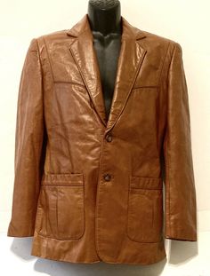 This is one cool jacket.... It looks like something that you would have seen on Starsky and Hutch!  It is in amazing condition and would make a great edition to anyone's collection, or would be great for a movie prop. Measures 18" from armpit to armpit buttoned Leather Blazer Outfit Men, Vintage Brown Sport Coat With Buttons, Vintage Brown Leather Jacket For Formal Occasions, Vintage Formal Blazer With Button Closure, Vintage Brown Blazer With Buttons, Retro Brown Outerwear For Formal Occasions, Retro Brown Formal Outerwear, Vintage Brown Sport Coat With Button Closure, Vintage Sport Coat With Pockets For Business