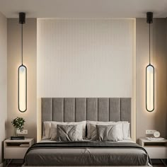 a modern bedroom with two hanging lights above the bed and nightstands on either side