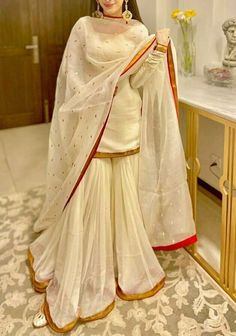 Plain Sharara With Heavy Dupatta, Satin Gharara Designs, Trending Wedding Dresses Indian, Pakistani Dresses For Engagement, White Sarara Dress, Dressing Ideas For Women Casual, Poses In Garara, Off White Salwar Suit, Plain Gharara