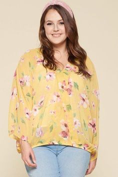 Made In U.S.A 1XL.2XL.3XL Plus size floral chiffon sheer surplice top featuring draped cross-front design with dolman, bell sleeves and elastic hem. (Layering garments not included.) 100% Polyester  Yellow  EME Plus Size Floral Chiffon Sheer Surplice Top Floral Chiffon Top, Surplice Top, Fitted Mini Dress, Maxi Styles, Tank Top Camisole, Sheer Chiffon, Floral Print Tops, Floral Chiffon