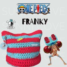 a red and blue crocheted pillow with the word franky on it's side