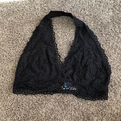 Black Lace Halter Neck Bralette Black Halter Top With Built-in Bra For Spring, Elegant Black Halter Top For Beach, Spring Black Halter Top Bra Friendly, Black Triangle Halter Top For Festival, Spring Black Bra-friendly Halter Top, Beach Crop Top, Black, Bra-friendly, Black Lace Bra For Spring, Black Beach Crop Top, Black Crop Top For Beach