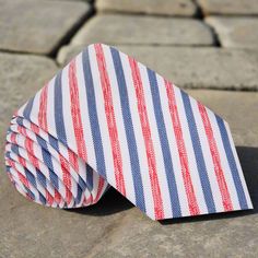 White with Blue and Red Stripes Necktie Red Tie For Spring Formal Occasions, Red Ties For Spring Formal Occasions, Red Formal Ties For Spring, Classic Red Ties For Summer, Red Tie As A Summer Gift, Red Fitted Summer Tie, Striped Summer Tie, Striped Summer Ties, Elegant Standard Tie With Vertical Stripes