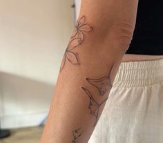 a person with a tattoo on their arm