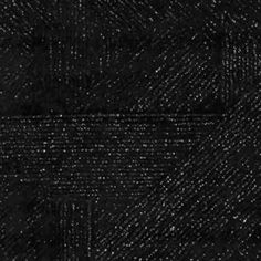 black and white textured fabric background with diagonal lines in the center, closeup