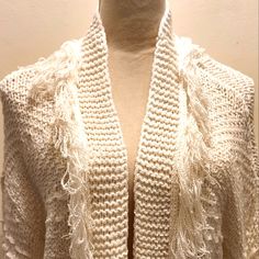 Creamy White Shawl Type Cardigan Stunning Different Knit With Fringes Chic White Open Knit Outerwear, White Soft Knit Cardigan, White Textured Knit Cardigan For Layering, White Chunky Knit Bohemian Sweater, White Bohemian Chunky Knit Sweater, Bohemian Hand Knitted White Cardigan, Cozy White Open Knit Cardigan, White Open Knit Cardigan, One Size White Crochet Sweater