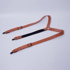 Classic Adjustable Belts And Suspenders For Everyday, Adjustable Leather Harness With Belt, Leather Harness With Adjustable Strap, Brown Leather Belts And Suspenders For Everyday, Classic Belts And Suspenders With Adjustable Strap For Everyday, Everyday Brown Leather Belts And Suspenders, Brown Leather Strap Belts And Suspenders, Adjustable Brown Leather Belts And Suspenders, Classic Leather Belts And Suspenders With Adjustable Fit