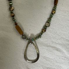 Rare Silpada Necklace: Abalone Shell, Green Howlite, Freshwater Pearl With .925 Ss Pendant And Lobster Clasp Closing. 18-20" *** Never Worn, Display Only. Great Condition! Sorry No More Silpada Boxes Left. Silver Teardrop Necklaces With Polished Beads, Silver Teardrop Beaded Necklace For Gift, Silver Teardrop Pendant Beaded Necklace For Gift, Silver Beaded Teardrop Pendant Necklace For Gift, Silver Teardrop Necklace With Lobster Clasp, Brown Sterling Silver Teardrop Necklace, Brown Teardrop Sterling Silver Necklace, Adjustable Silver Turquoise Necklace With Lobster Clasp, Silpada Jewelry