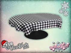 a table with a black and white checkered cloth on it, surrounded by snowflakes