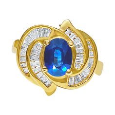 Centering a 0.89 Carat Oval-Cut Ceylon (Sri Lanka) Blue Sapphire, accented by Baguette-Cut Diamonds, and set in 14K Yellow Gold. Details: ✔ Center Stone: Blue Sapphire ✔ Sapphire Weight: 0.89 carats ✔ Sapphire Origin: Thailand ✔ Sapphire Cut: Oval ✔ Diamond Weight: 0.40 carats total ✔ Diamond Cut: Baguette ✔ Metal: 14K Gold ✔ Ring Weight: 5.1 grams Ceylon Sri Lanka, Ring Bands, 2025 Wedding, Ceylon Blue Sapphire, Vintage Cocktail Ring, Diamond Cocktail Ring, Baguette Ring, Gold Cocktail Ring, Gold Cocktail