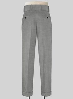 For a subtle yet sophisticated look opt for our Napolean Worsted Light Gray Wool Double Gurkha Trousers which is an excellent choice. Crafted from wool blend, the fabric of the trousers exude texture that is contemporary and versatile enough to don on any occasion. The best masterpiece you can have to add to your wardrobe. 
 
 Look Includes  Napolean Worsted Light Gray Wool Fabric  Cross Pocket  Two Pleated Front  Double Button Fastening Wide Waistband  Diamond Pocket On Right  1.5inch Trouser C Wool Business Casual Suits With Tapered Leg, Wool Tapered Leg Suits For Business Casual, Wool Tapered Leg Business Casual Suit, Elegant Suiting Fabric Bottoms For Office Wear, Elegant Bottoms In Suiting Fabric For Office, Elegant Office Bottoms In Suiting Fabric, Wool Suits With Straight Leg, Wool Suits For Work With Straight Leg, Wool Suits With Straight Leg For Work