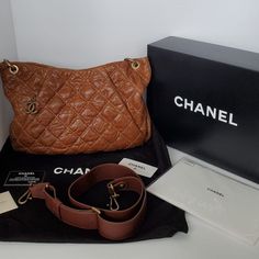 This Is An Authentic Brand New Chanel Crumpled Grained Calfskin Coco Pleats Hobo In Brown. This Stylish Tote Is Crafted Of Diamond Quilted Calfskin Leather In Glossy Brown. This Bag Features An Aged Gold Chain Link Strap With A Leather Shoulder Pad, An Optional Cross-Body Strap. The Button Snap Opens To A Burgundy Fabric Interior With A Zipper And Patch Pockets. I Am Open To Offers. Size Base Length: 16.00 In Height: 10.25 In Width: 1.25 In Drop: 6.25 In Drop: 18.00 In Comes With: Original Box D Designer Calf Leather Shoulder Bag With Leather Backing, Designer Textured Leather Shoulder Bag, Designer Pebbled Leather Shoulder Bag With Leather Lining, Designer Textured Leather Shoulder Bag For Business, Designer Textured Leather Business Shoulder Bag, Designer Business Shoulder Bag In Textured Leather, Pebbled Leather Shoulder Bag With Grained Texture For Work, Workwear Shoulder Bag In Pebbled Leather With Grained Texture, Office Leather Shoulder Bag With Grained Texture