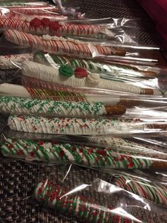 many different types of candy canes wrapped in plastic