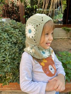 Crochet kids balaclava's are the perfect way to stay warm and stylish during the winter months. These unique, handmade accessories are made from soft yarn and can be worn in a variety of ways, from covering the head and neck to covering the entire face. ❤️❤️ The Crochet Grannysquare Balaclava is a great option for those who want a more traditional, cozy look. The granny square pattern adds a touch of nostalgia while the yarn material keeps you warm and protected from the wind and cold. ❤️❤️ Knitted Balaclava for Women are great for ladies who want a comfortable and fashionable way to stay warm. These balaclava's come in different designs and styles and are perfect for everyday wear. They are also a great option for outdoor activities such as skiing, snowboarding, and hiking. ❤️❤️ The Grann Crochet Balaclava Baby, Toddler Balaclava Knit Pattern, Crochet Winter Hat, Crochet Balaclava, Crochet Winter Hats, Knitted Balaclava, Cozy Accessories, Crochet Winter, Baby Bonnet