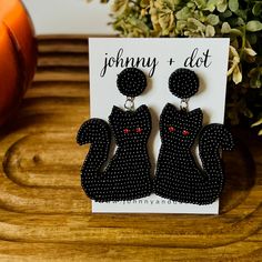 Add some Halloween charm to your look with these adorable beaded black cat earrings! Lightweight and easy to wear, they’re the perfect accessory for teachers or anyone looking to embrace the season. With their playful design, these earrings are a fun way to show off your spooky side. DETAILS: Measures 1 1/4 inches wide x 2 1/2 inches long Lightweight at just 2 ounces each Affordable Halloween Statement Earrings, Affordable Statement Halloween Earrings, Cute Black Cat Earrings, Black Cat Earrings, Halloween Charms, Cat Halloween, Halloween Earrings, Black Cat Halloween, Cat Earrings