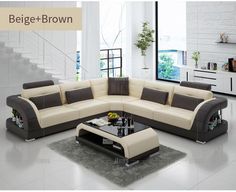 a modern living room with white and brown furniture