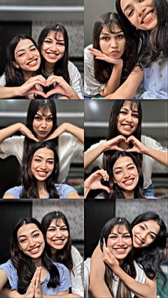 two women making the shape of a heart with their hands and smiling at the camera