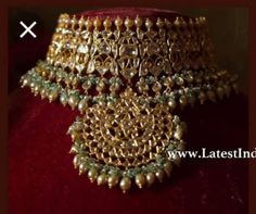 This opulent choker set is fit for a bride and even her close ones attending the wedding. This choker is a perfect amalgam of timeless style and drama that draws in attention. Necklace Closure - Adjustable Dori Earrings Closure - Push Back Style Tip - When it comes to getting a classic look, nothing can be better than kundan. This necklace set is fit for a woman who is fiercely independent yet rooted in traditional and cultural heritage, carving her own style with classic and timeless fashion ch Hand Set Chandbali Choker For Wedding, Bollywood Heavy Choker For Wedding, Traditional Wedding Choker Hand Set, Traditional Chandbali Choker For Wedding, Traditional Chandbali Wedding Choker, Traditional Tilla Choker For Wedding, Heavy Chandbali Choker For Reception, Heavy Choker For Wedding And Diwali, Traditional Choker For Wedding And Festivals