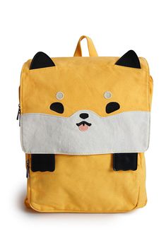 Celebrate your Shiba love with this cute canvas backpack! It's the perfect book bag for the dog lover-on-the-go! There are two color variations to choose from: black or sesame! The flap front is held down by magnets under the paws. Under the flap, the bag has one big main pocket that's zippered, plus a front pocket. The interior is lined in a dark brown smooth fabric. The big interior pocket has a zipper compartment, plus sleeve pockets for your phone, wallet, and a work folder. There is a secret pocket on one side of the bag. The back of the bag is padded for comfort and has adjustable straps. Zippers have holes on the ends so you can even add a keychain yourself! Bag size is approximately 12.5 in. x 10.5 in. x 3.75 in. Sesame Shiba, Work Folders, Secret Pocket, Angry Cat, Cute Canvas, Canvas Backpack, Book Bag, Phone Wallet, Shiba Inu