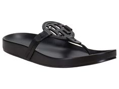 PRICES MAY VARY. Chic meets sporty fashion with the Tommy Hilfiger Relina footbed sandals featuring the iconic Tommy Hilfiger logo. Open Toe Slip on Closure Imported Cheap Tommy Hilfiger Synthetic Sandals, Sporty Fashion, Tommy Hilfiger Logo, Footbed Sandals, Synthetic Rubber, Tory Burch Miller Sandal, Kids Luggage, Tommy Hilfiger Women, Luxury Store