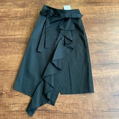 - Designer = Robert Rodriguez. - Size = 2. Trunk 70 - Msrp = $325 - Color = Black.1 - Women’s Belted Fitted Size 2 Cotton Skirt. - 100% Cotton. - Length Measured From The Front, From Top Tip Of Waist Line To Bottom Tip Of Longest Part Of Skirt = 88cm - Genuine And Authentic Or Your Money Back.6 Trunk 70 Chic Fitted Wrap Skirt For Office, Chic Fitted Wrap Skirt For Work, Chic Spring Office Wrap Skirt, Chic Spring Wrap Skirt For Office, Chic Black Asymmetrical Wrap Skirt, Chic High Waist Wrap Skirt For Workwear, Chic Knee-length Wrap Skirt For Work, Black Asymmetrical Skirt For Workwear, Black Asymmetrical Skirt For Work