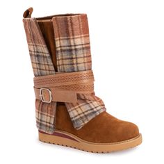 Plush & warm, MUK LUKS Women's Slope Nikki Boots blend luxe comfort with fashionable style. A faux suede belt wraps our fun pattern sweater detail for a twist on a classic pull-on boot. nWipe with a damp cloth to clean, no bleach, lay flat to dry. Imported.- Treaded EVA Sole- 100% Polyester Faux Suede Upper- 100% Polyester Faux Fur Luxe Lining- 100% Polyester Faux Fur Luxe Insole- Memory Foam Insole- Multiple Color Options- Women's Whole and Half Sizes 6-11- Extended Wide Sizes Available Waterproof Snow Boots, Closed Toe Shoes, Suede Belt, Womens Mid Calf Boots, Pull On Boots, Winter Boots Women, Eva Sole, Pattern Sweater, Womens Wedges