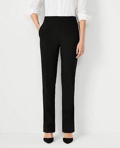 Elevate your wardrobe with the timeless elegance of Ann Taylor's The Side Zip Straight Pant in Bi-Stretch. Perfect for a seamless transition from day to night, these pants offer a sophisticated straight-leg silhouette that skims your legs for a chic, structured look.

- **Size**: 2
- **Color**: Black
- **Gender**: Female
- **Material**: 66% Polyester, 28% Rayon, 6% Spandex
- **Fit**: Regular fit, lean through the hip and thigh
- **Rise**: High rise, sits 1/2" to 1" below natural waist
- **Length Knitted Suit, Professional Wardrobe, Suit Separates, Black Dress Pants, Stretch Pants, Chic Woman, Straight Pants, Polished Look, Straight Leg Pants