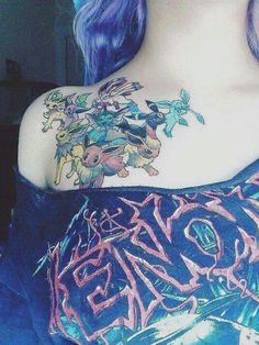 a woman with purple hair and tattoos on her chest