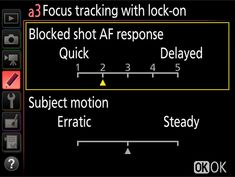 the text on the screen is highlighted in red and yellow, which reads 3 focus tracking with lock - on blocked shot af response quick