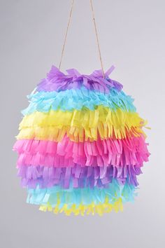 a multicolored pinata hanging from a string