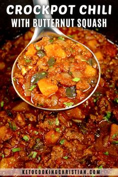 a spoon full of crockpot chili with butternut squash