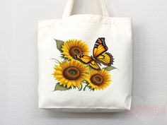 Carry the sunshine with you wherever you go with our Sunflower Tote Bag. Made from durable and eco-friendly materials, this bag features a beautiful sunflower design that is sure to brighten up any outfit. Perfect for everyday use, it has plenty of room for all your essentials and is comfortable to carry with its sturdy handles. Order now and bring a little bit of nature wherever you go! canvas tote bag, flower tote bag, tote bag canvas, eco friendly bag, aesthetic tote, reusable bag, cottagecor Summer Flower-shaped Canvas Bag, Floral Canvas Bag For Daily Use In Summer, White Flower-shaped Canvas Bag For Summer, Sunflower Tote Bag, Cottagecore Bag, Butterfly Bag, Flower Tote Bag, Butterfly Bags, Flower Tote