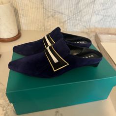 - Derek Lam Blue Suede Mule Loafers - Short Heel; White Leather And Gold Detailing At Top - Suede Upper And Leather Inner - Brand New; Never Worn Before; Comes With Original Box - Made In Italy Blue Elegant Round Toe Slip-ons, Elegant Blue Round Toe Slip-ons, Elegant Blue Slip-ons With Round Toe, Elegant Blue Slip-ons For Work, Blue Pointed Toe Slip-on Loafers, Blue Slip-ons With Leather Sole For Spring, Blue Flat Heel Slip-ons For Formal Occasions, Spring Blue Slip-ons With Leather Sole, Blue Leather Flat Heel Mules