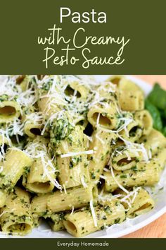 pasta with creamy pesto sauce on a plate