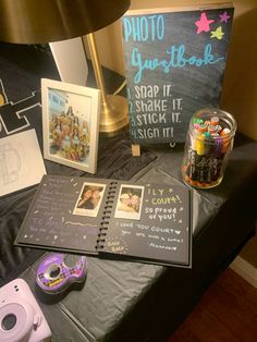 a table topped with pictures and other items